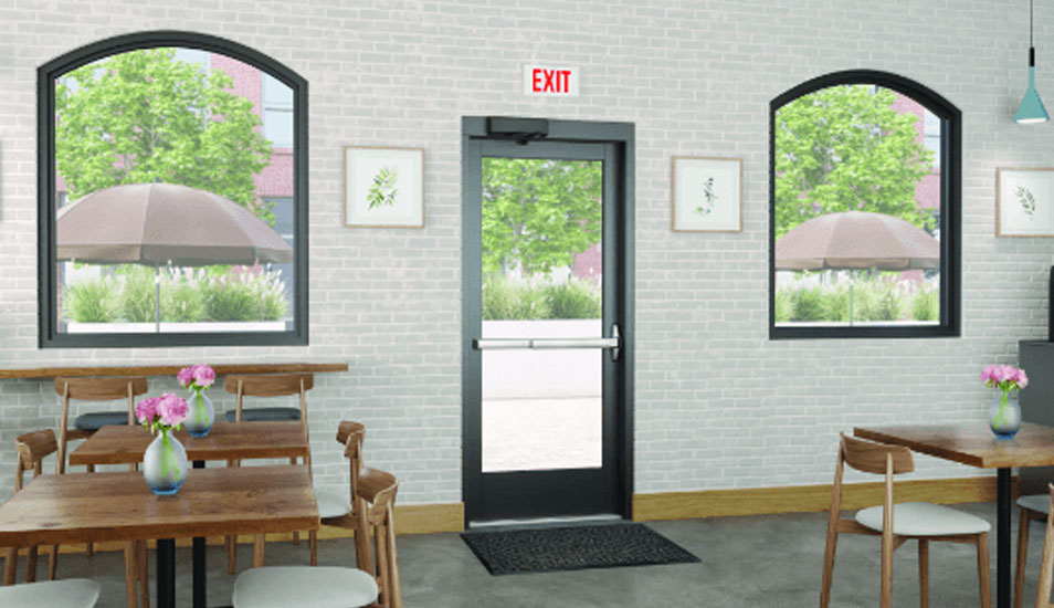 Commercial retail store showing tables and chairs and glass door